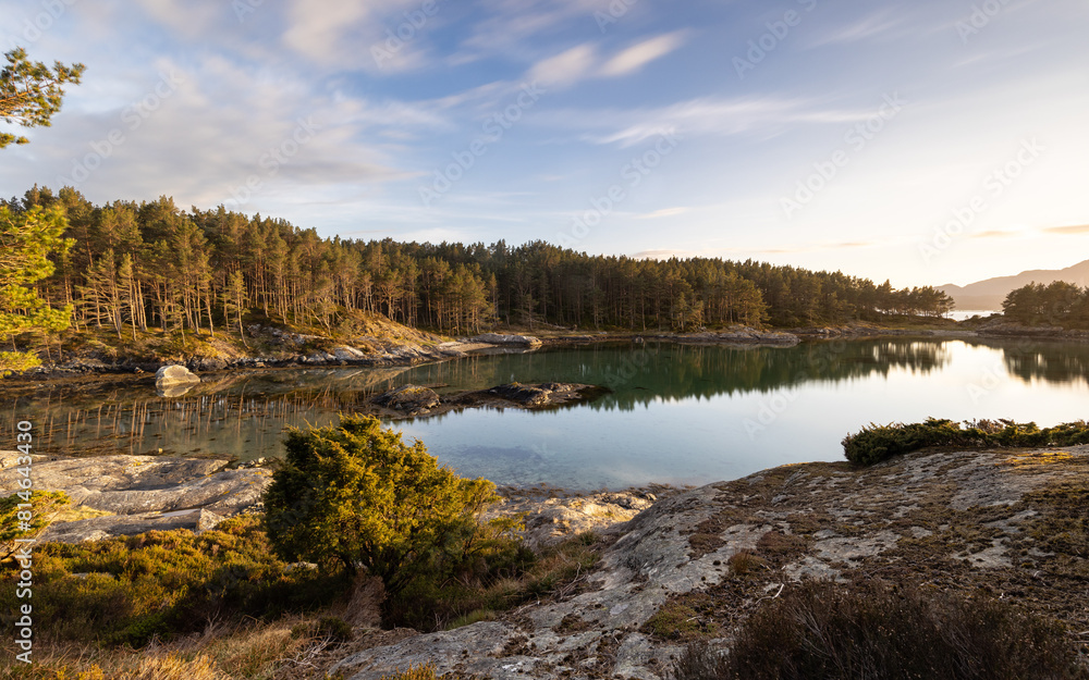 A phenomenal golden hour sunset in Norway over the bay and fjords of Stord and the surrounding area