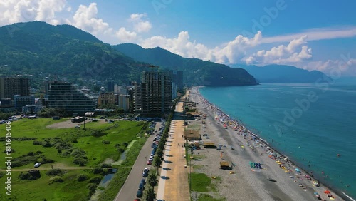 Drone footage of Gonio Beach and under construction seafront building on a sunny day, Gonio, Georgia photo