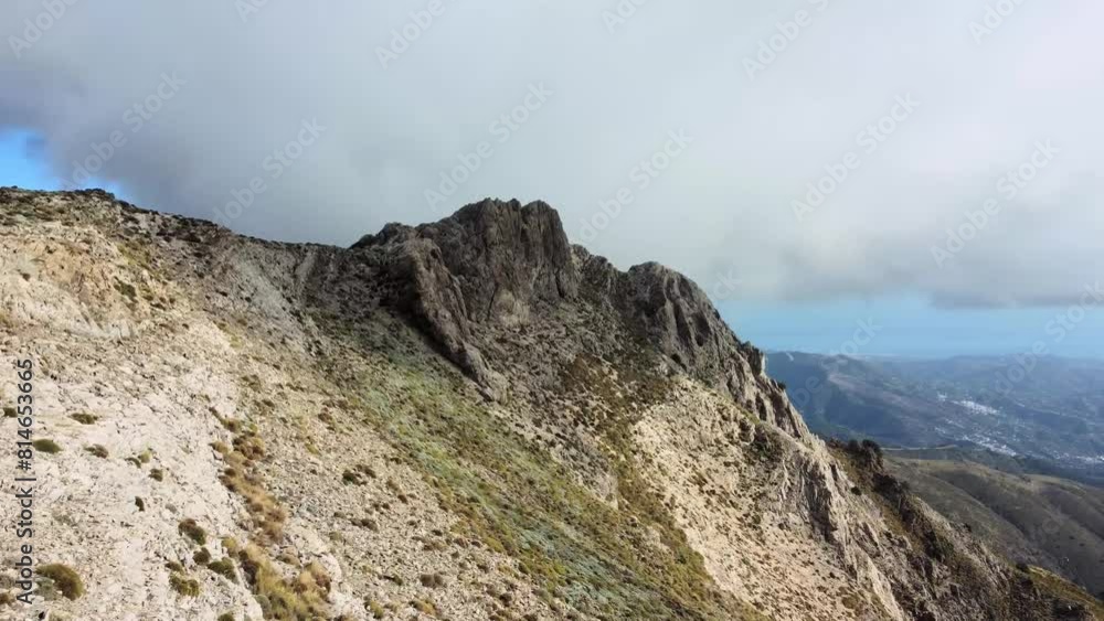 Drone shot of the mountains in Rio Almanchares canyon on a sunny day in Canillas de Aceituno, Spain Drone shot of the mountains in Rio Almanchares canyon on a sunny day in Canillas de Aceituno, Spain