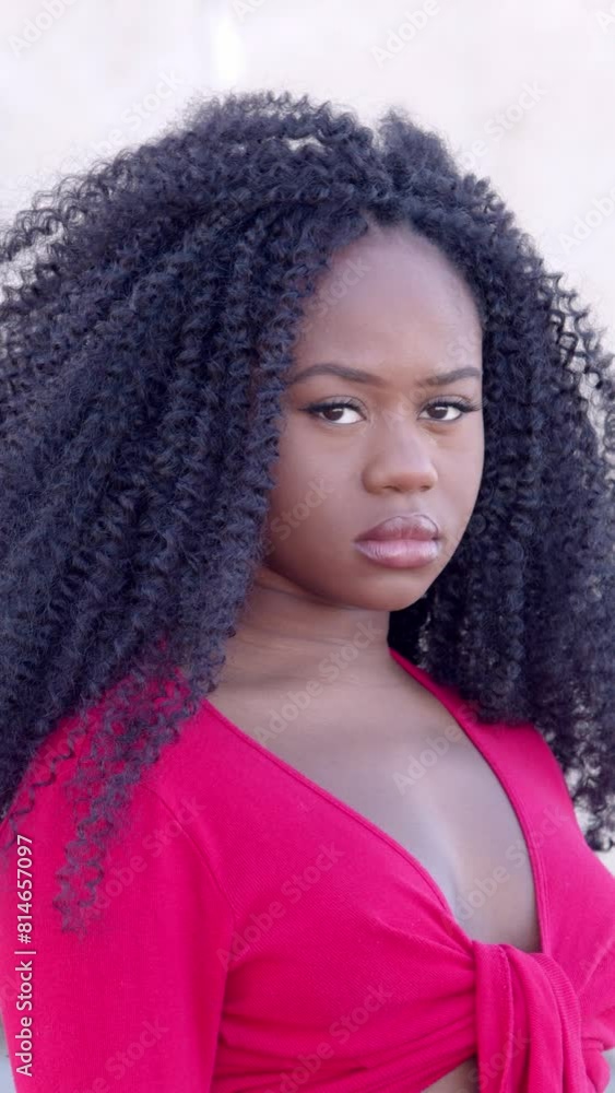 Attractive young black cute woman smiling at camera Attractive young black cute woman smiling at camera