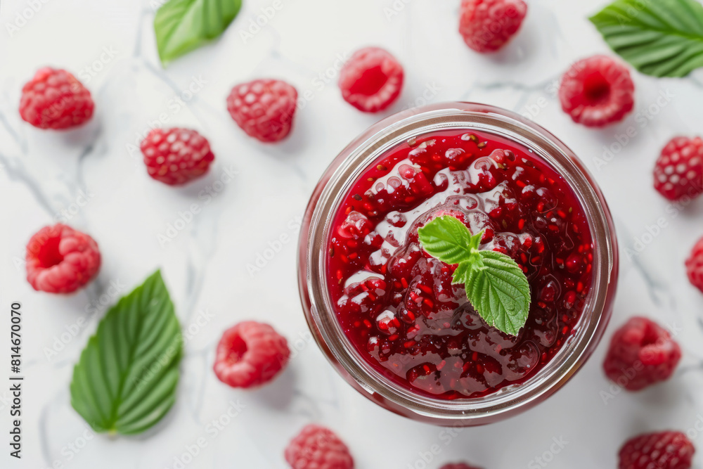 Glass jar with raspberry jam and raspberries with leaves Glass jar with raspberry jam and raspberries with leaves
