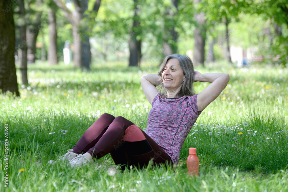 Portrait photo of happy senior Caucasian woman relaxing and breathing fresh air with sunlight in outdoors park. Elderly woman enjoying a day in the park on summer. Healthcare lifestyle and wellness Portrait photo of happy senior Caucasian woman relaxing and breathing fresh air with sunlight in outdoors park. Elderly woman enjoying a day in the park on summer. Healthcare lifestyle and wellness