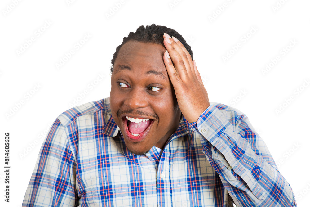 Happy surprised young man looking to the side Happy surprised young man looking to the side