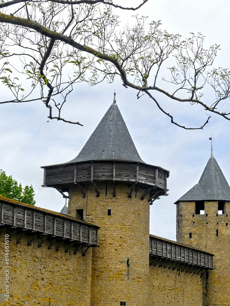 Carcassonne, May 2024: Visit the magnificent walled city of Carcassonne in Occitanie. Street photos - View of the fortified castle and ramparts protecting the historic town. Carcassonne, May 2024: Visit the magnificent walled city of Carcassonne in Occitanie. Street photos - View of the fortified castle and ramparts protecting the historic town.