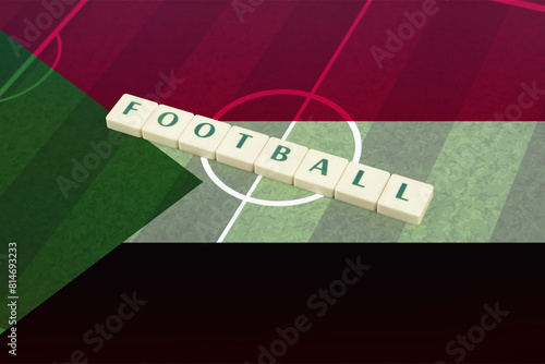 Football text on field with Sudan flag, soccer ball and national flag, tournament or competition
