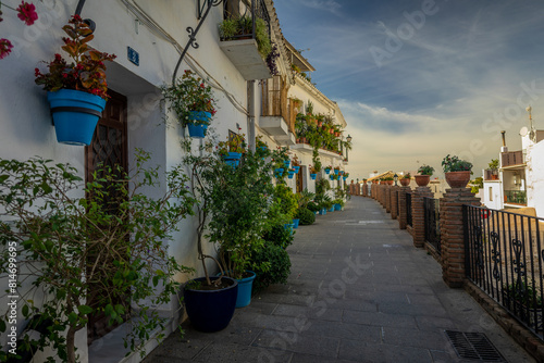 Charming Alleyways of Mijas: Traditional Andalusian Street with Flower Pots