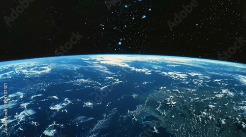 Astronauts gazing down upon Earth, surveying the vastness of the universe. Earth appears like a jewel with blue oceans and green landmasses in the dark expanse of space, evoking awe and awareness of h