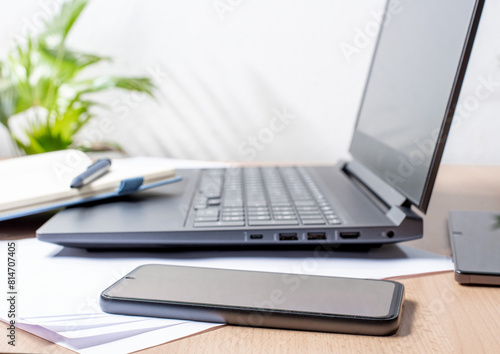 Office equipment on a wooden table close-up