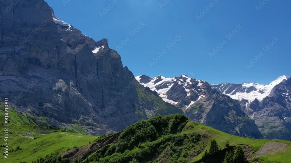 Cinematic drone shot flying over mountain of Grindelwald valley in Switzerland Bernese Alps Cinematic drone shot flying over mountain of Grindelwald valley in Switzerland Bernese Alps