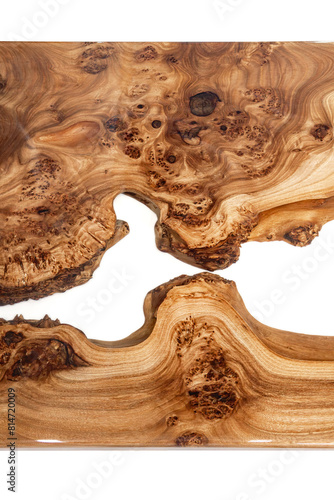Live edge elm burl slab table top with central epoxy resin river on white background, top view of fragment elm epoxy table