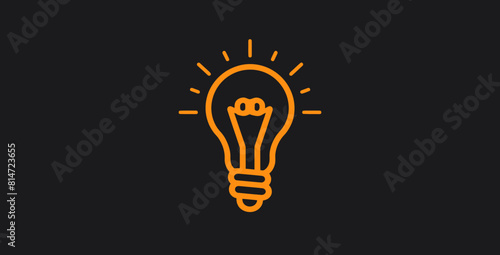 an orange light bulb on a black background