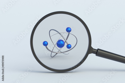 Atom model behind magnifying glass. 3d render