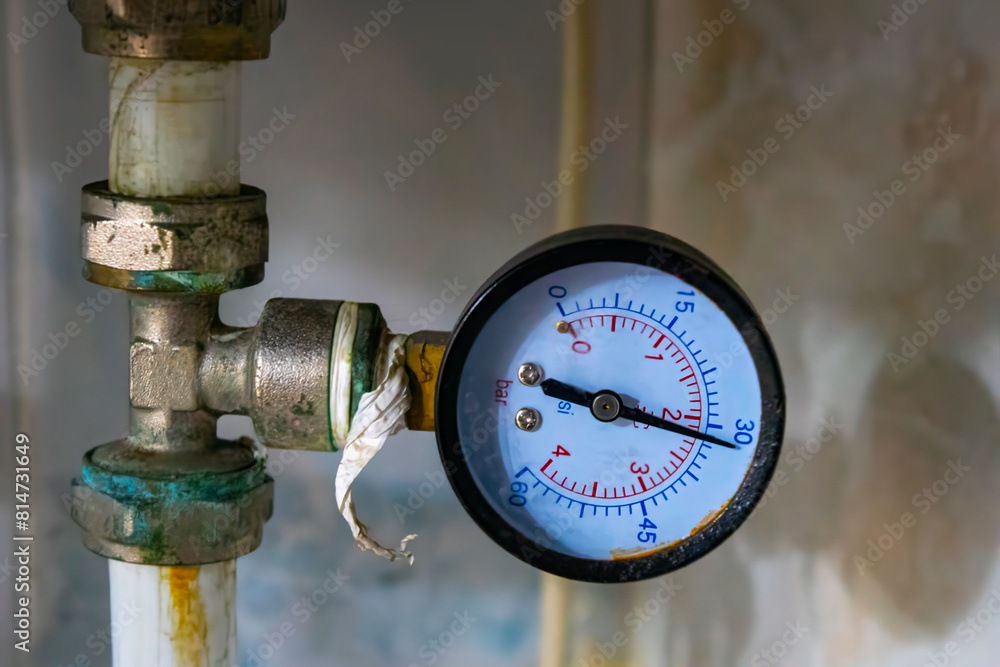 pressure gauge was mounted on the old machine, measuremant and equipment in the industry pressure gauge was mounted on the old machine, measuremant and equipment in the industry