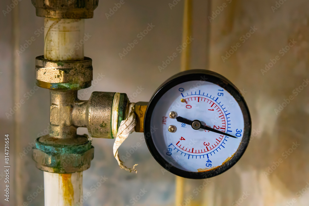 pressure gauge was mounted on the old machine, measuremant and equipment in the industry pressure gauge was mounted on the old machine, measuremant and equipment in the industry