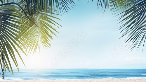 Beautiful tropical beach setting with palm trees and a calm sea.  Idyllic tropical beach featuring palm trees and turquoise ocean. © ArtWorld