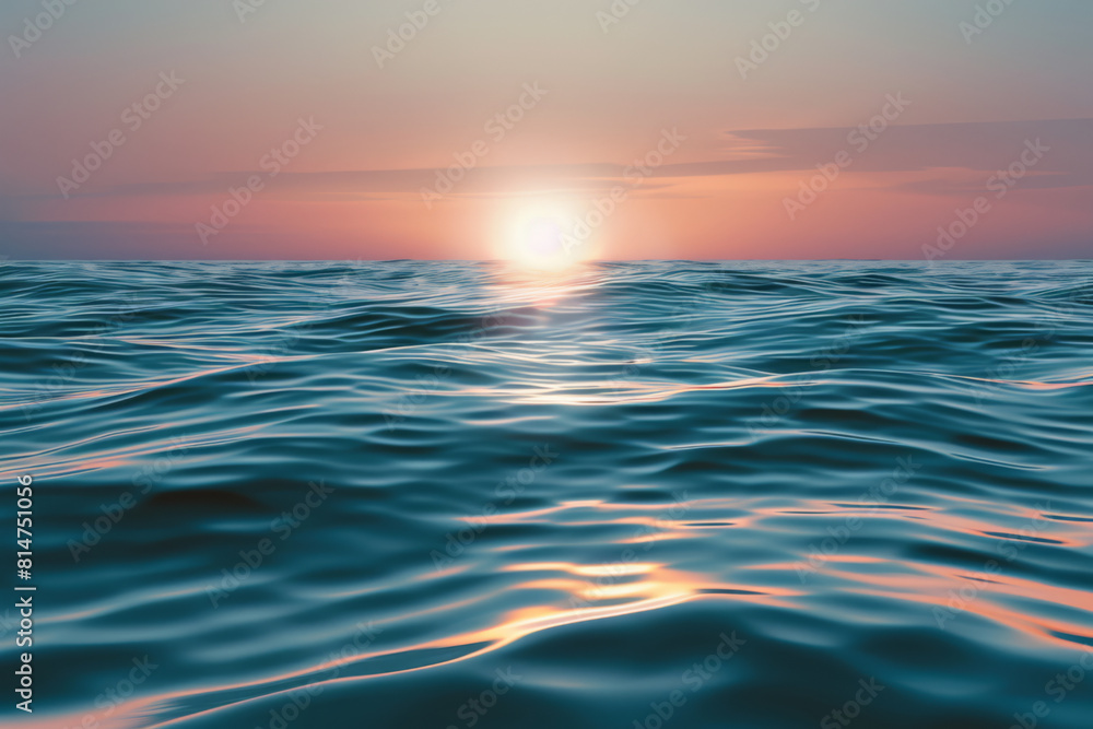 The ocean is calm and the sun is setting, creating a beautiful The ocean is calm and the sun is setting, creating a beautiful