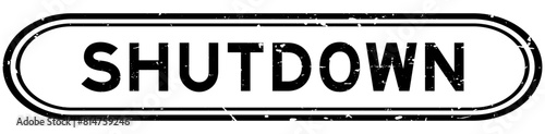 Grunge black shutdown word rubber seal stamp on white background