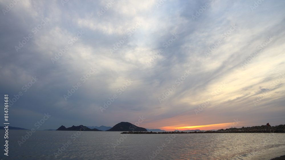 sunset on the beach. Seaside town of Turgutreis and spectacular sunsets. Selective Focus. Long Exposure shoot. tranquility scene. sunset on the beach. Seaside town of Turgutreis and spectacular sunsets. Selective Focus. Long Exposure shoot. tranquility scene.