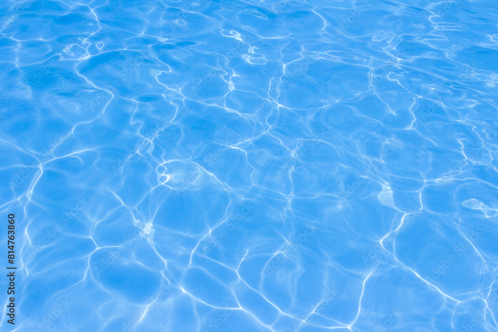 The light reflects blue in the water in the swimming pool. It looks fresh and lively, suitable for use as a wallpaper.