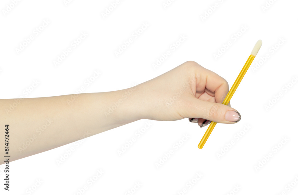 velor eyelash applicator in hand, outstretched hand with velor eyelash applicator isolated from background