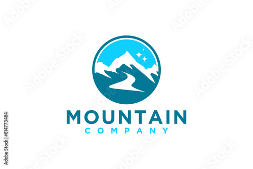 Outdoor design logo rocky snowy mountain peak with flowing river.