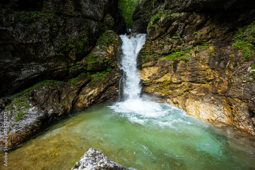 Rio di Repepeit. Wonderful waterfall that falls from a cliff. The force of the waterfall is a sight to behold. Hiking, trekking in the open area surrounded by woods. Summer holidays, peace. Rio di Repepeit. Wonderful waterfall that falls from a cliff. The force of the waterfall is a sight to behold. Hiking, trekking in the open area surrounded by woods. Summer holidays, peace.
