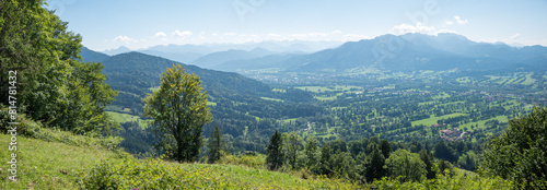 Cultural landscape near Lenggries with parallel tree hedges. View from Sunntraten mountain photo