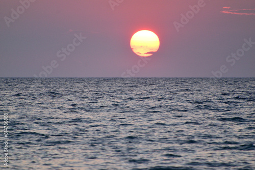 Fototapeta Naklejka Na Ścianę i Meble -  Sunset over the sea - Zematas Beach, Lemnos, Greece, Aegean Sea