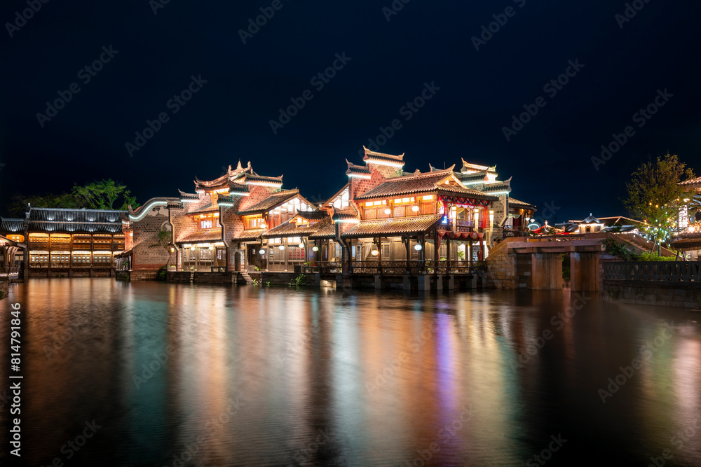Fototapeta premium At night, the beautiful ancient town of Lizhuang on the lake, Yibin City, Sichuan Province, China