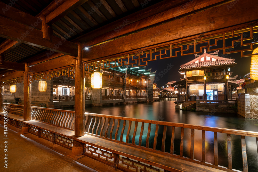 Fototapeta premium At night, the beautiful ancient town of Lizhuang on the lake, Yibin City, Sichuan Province, China