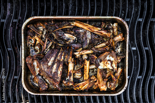 Roasted beef bones for making jus photo