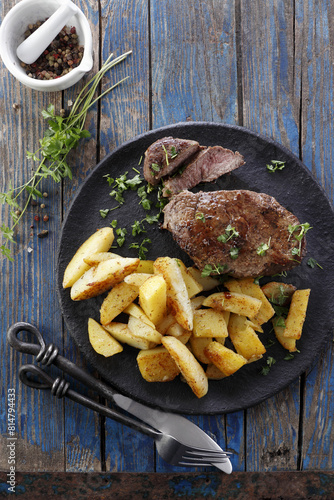 Beef steak with roasted potatoes