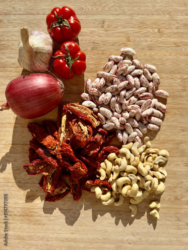 sundried tomatoes, borlotti beans, cashews, onion, garlic, tomatoes (vegan ingredients) photo