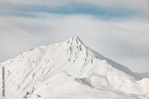 Snow-covered mountain peak in a winter landscape