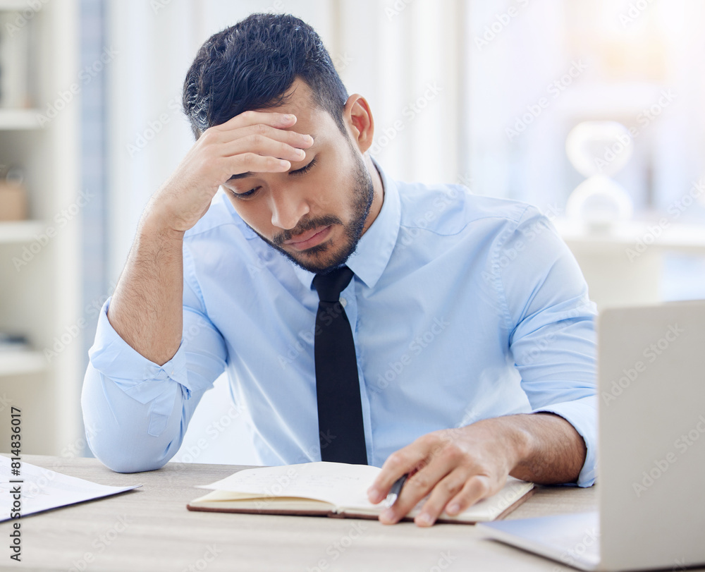 Businessman, desk and notebook for stress and burnout, writing and research in office. Headache, corporate and laptop for financial advisor for male person, deadline or notes for audit and overworked Businessman, desk and notebook for stress and burnout, writing and research in office. Headache, corporate and laptop for financial advisor for male person, deadline or notes for audit and overworked