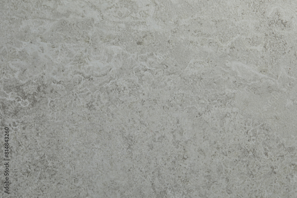 Fototapeta premium Grey concrete textured surface as background, closeup