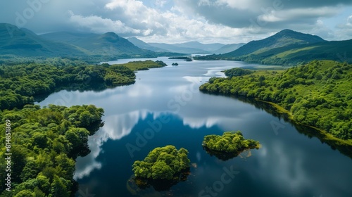 Aerial view of the lakes of Killarney in Ireland, a serene and picturesque setting known for its sparkling waters, lush w