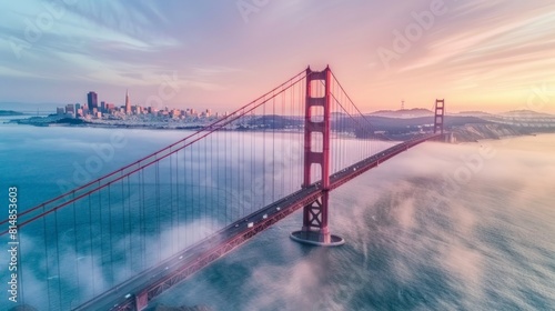 Aerial view of the Golden Gate Bridge in San Francisco, California, USA, with the iconic red bridge spanning the golden s