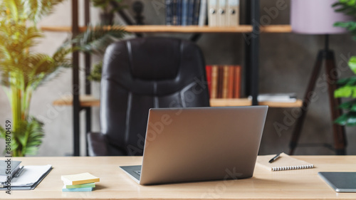 Wallpaper Mural Close-up of open laptop on wooden table. Nearby is a tablet computer, a smartphone, paper graphics, pencil holder. Empty office home workplace. Workspace with computer in apartment Torontodigital.ca