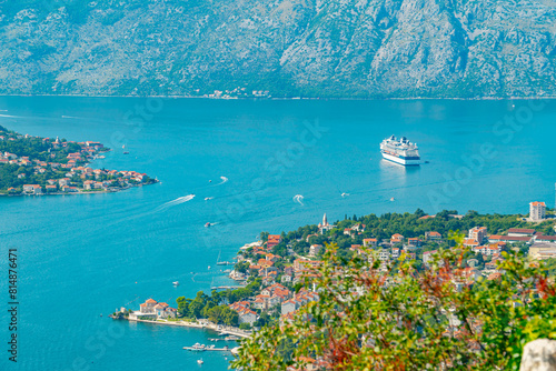 Spectacular View of Kotor Bay: Mountains, Cruise Ship, and Azure Waters