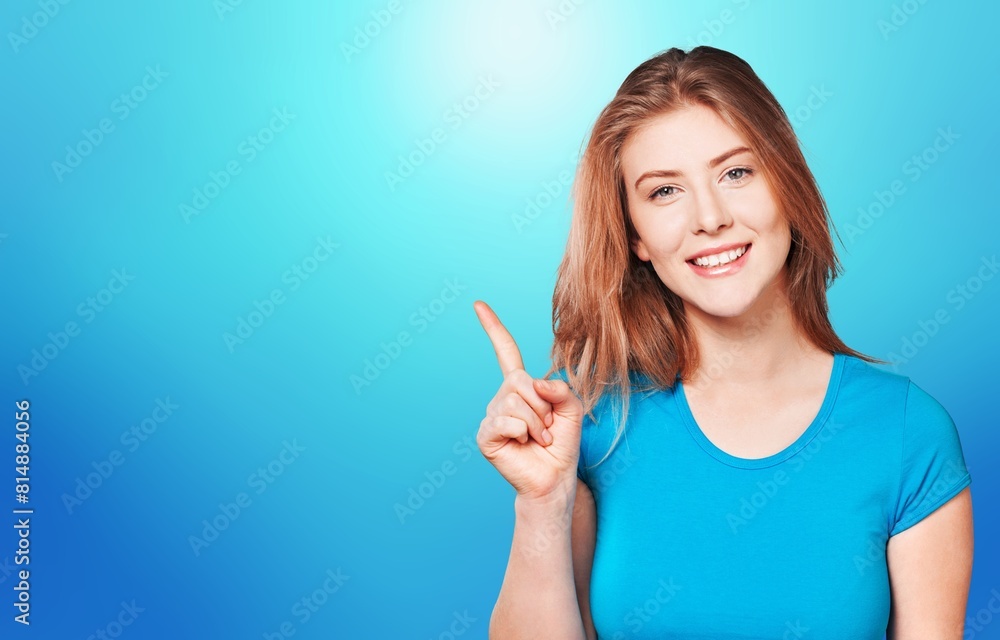 Young woman pointing with hands to the side. Young woman pointing with hands to the side.