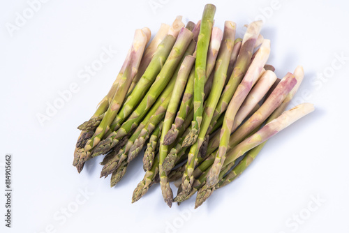 Green asparagus pattern on background. Vegetable sprouts stems. Fresh food