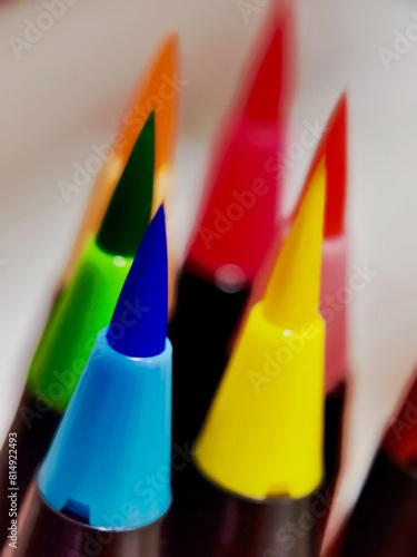 Close Up Of A Bundle Of Uncapped Markers photo