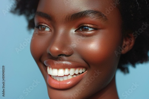 Depicting a close up of woman's jaw with teeth shining white photo