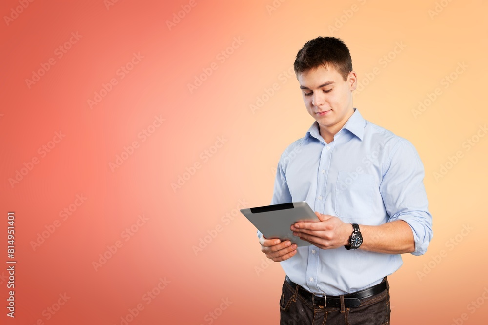 Photo of cool businessman communicating on modern gadget Photo of cool businessman communicating on modern gadget