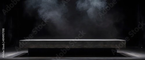 The stone display stands were billowing smoke against a black background.