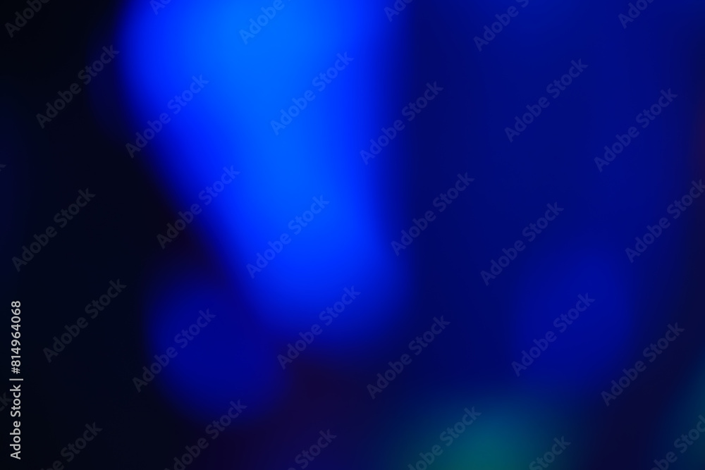 Abstract image with dark blue soft undefined shapes on a black background. Abstract image with dark blue soft undefined shapes on a black background.
