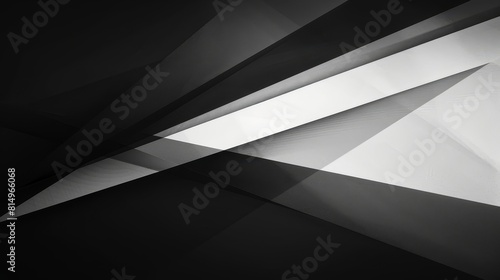  A monochrome photo features an abstract design  with its lower half displaying a black and white geometric pattern