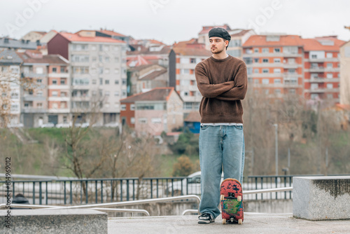 young man on the street with skateboard