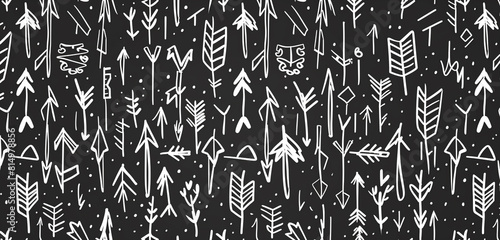Direction symbols and arrows doodled in a seamless black and white pattern.